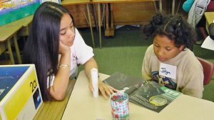 Photo: Student Reading with a Tutor