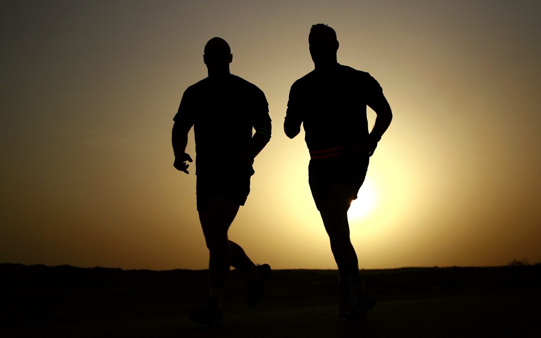 Photo: Two men running