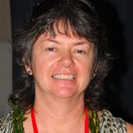 Kelly_Roberts Kelly Roberts smiling with lei around her neck.