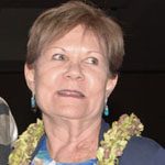 Laura_Poell Laura Poell smiling with lei around her neck.